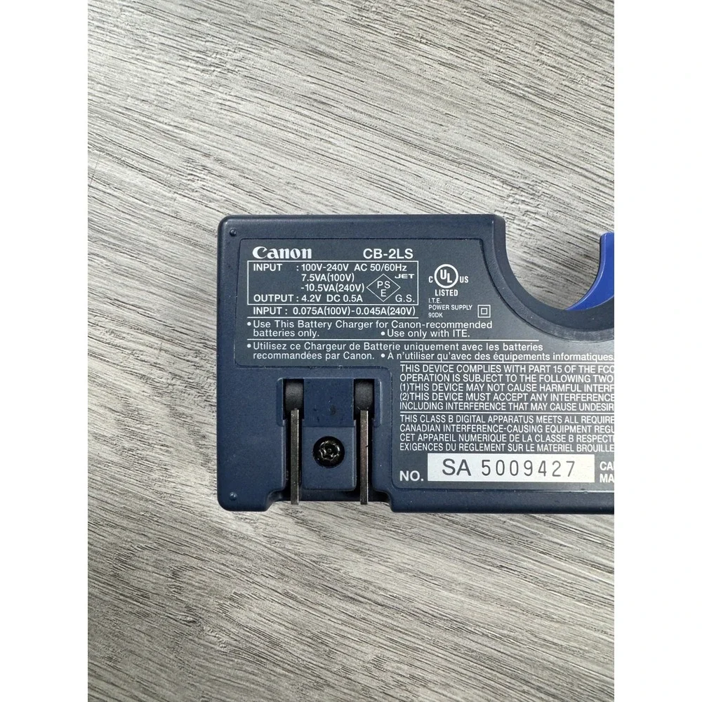 Canon OEM battery charger CB-2LS Power Shot S100 S200 S300 S400 S410 S500 876